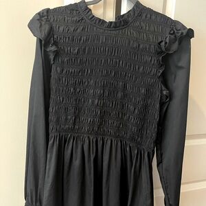 Stylish cute medium black dress, ruched on top half. Never worn.